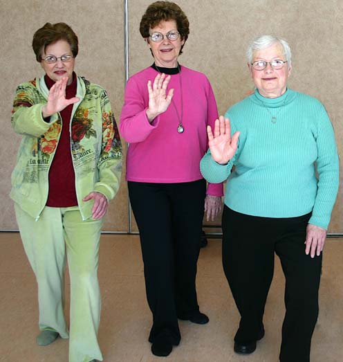 3 seniors doing Tai Chi